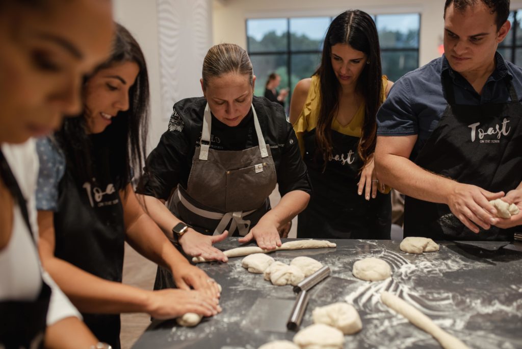 Chef Rosana teaching a group cooking class