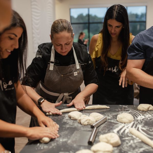 Chef Rosana teaching a group cooking class